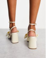 Hitched bow detail mid block heeled sandals in ivory
