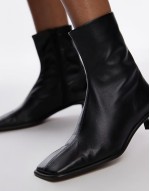 Noah premium leather heeled smart boot in black